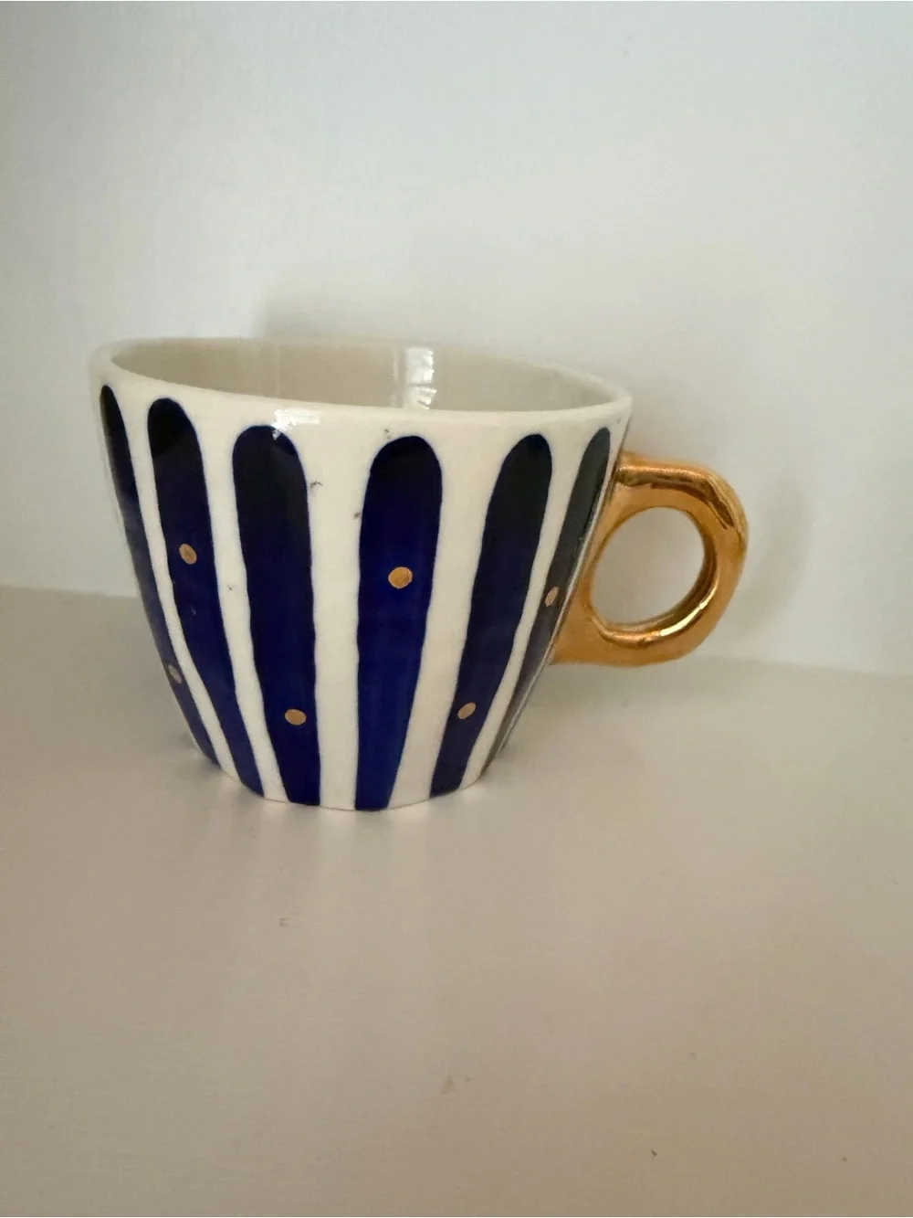 Anthropologie Hand-Painted Navy Stripe Ceramic Cup with Gold Handle